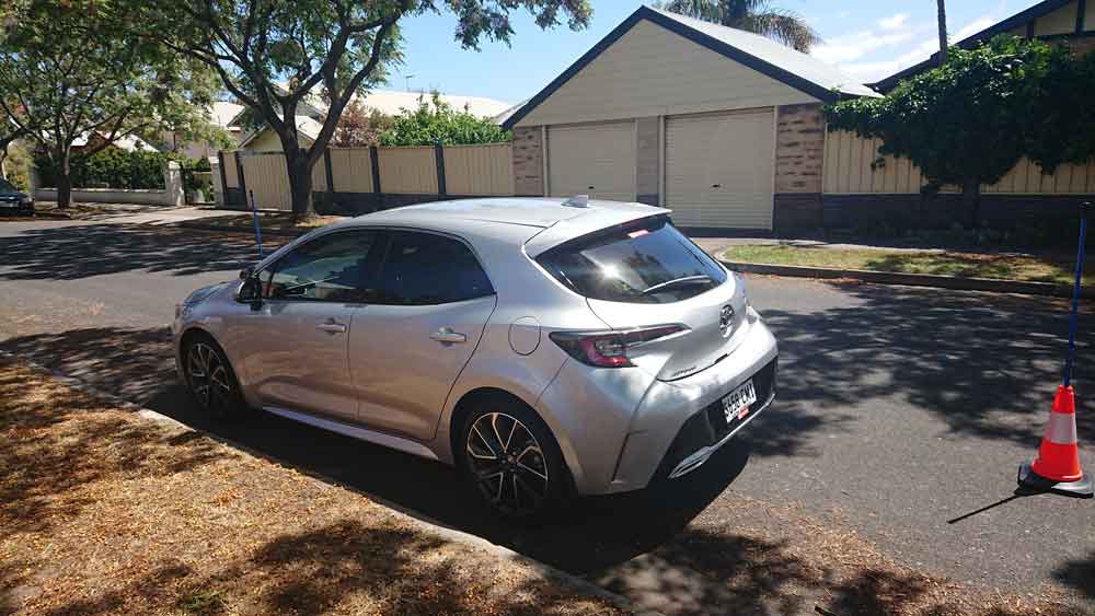Driving Instructor in Port Adelaide parking a Silver Toyota Corolla